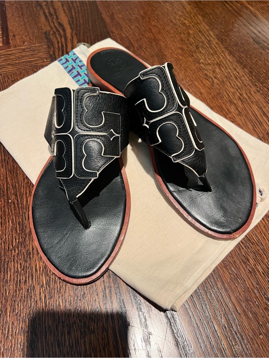 Tory Burch Shoes - Tory Burch Black Leather Logo Thong Sandals with white detail.